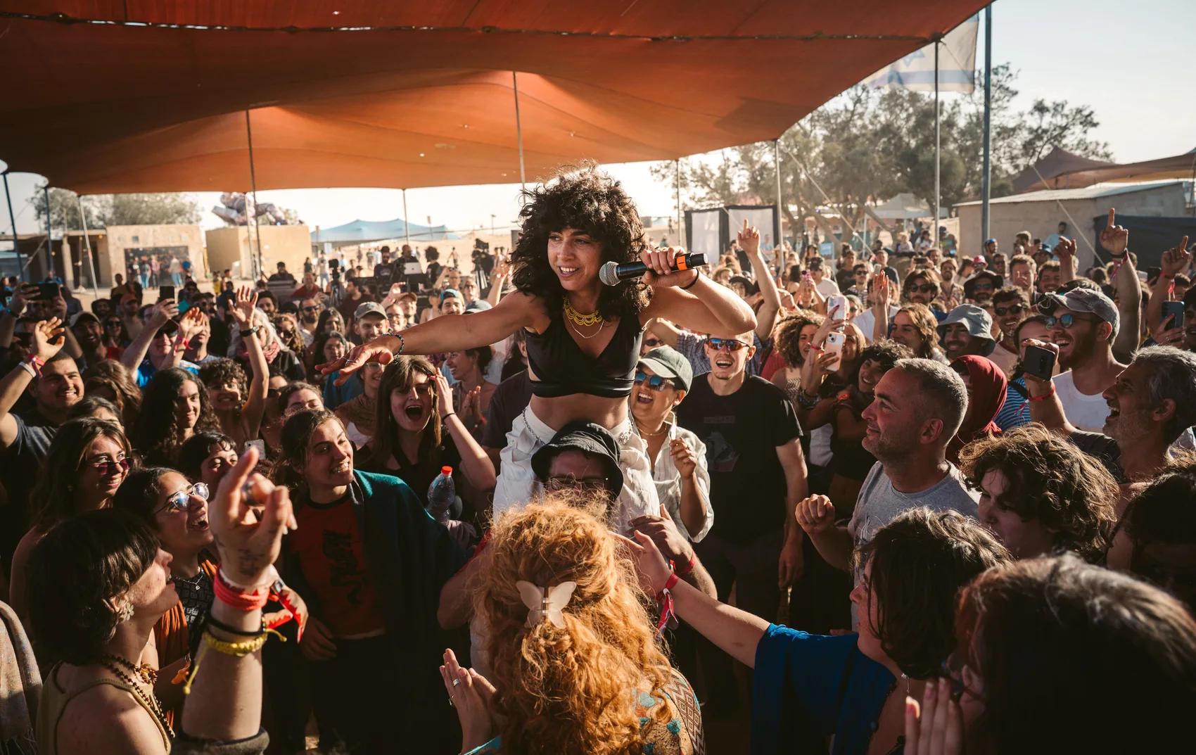 Hazeavot surrounded by an energetic festival crowd