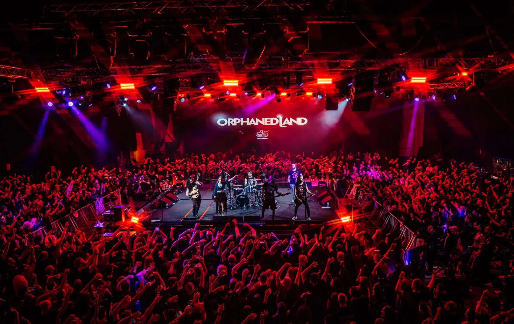 Orphaned Land performing to a packed venue