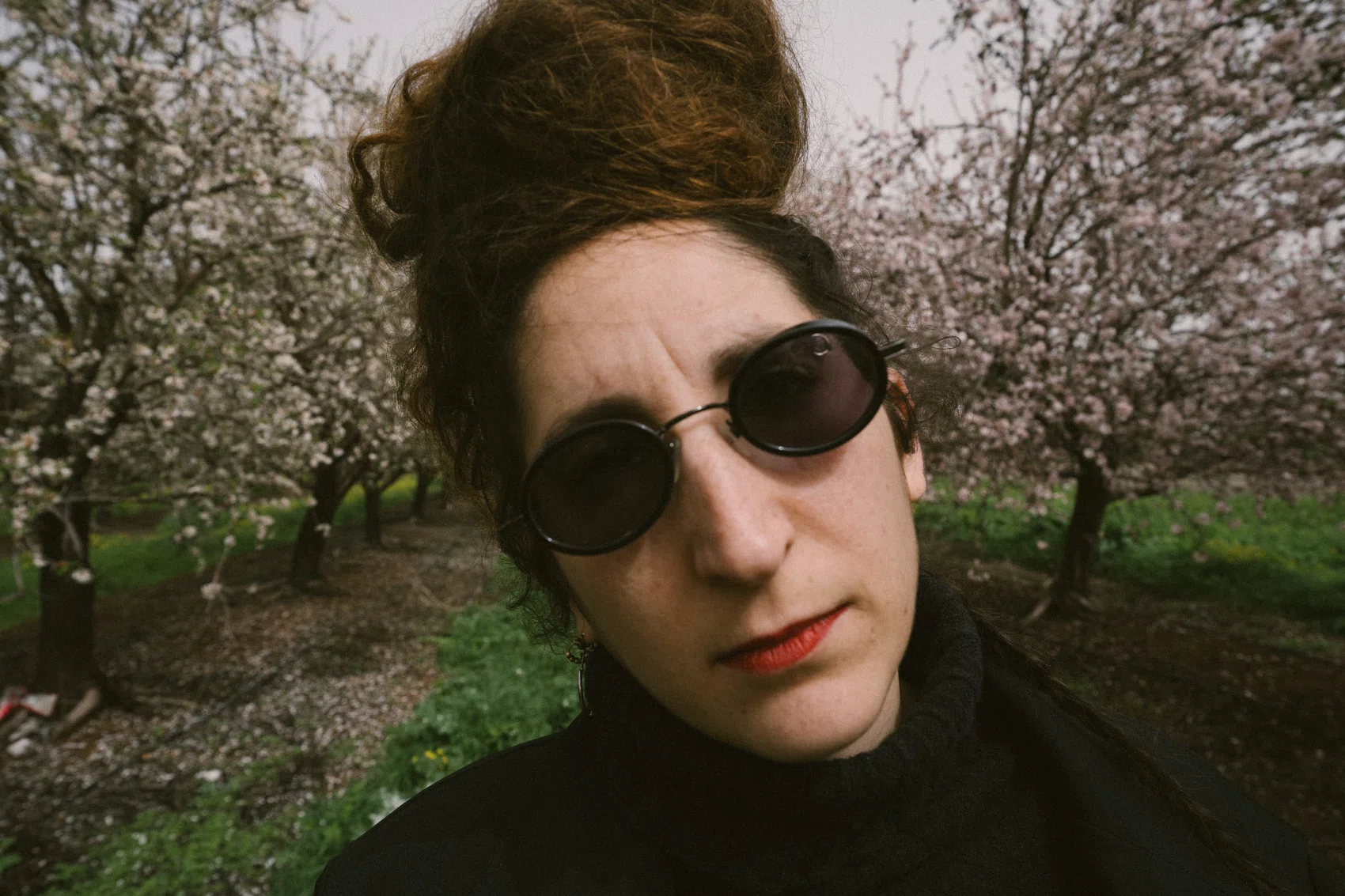 Wide-angle environmental portrait of Talya